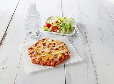 Authentic Fiestada Pizza Toppings - Seasoned Beef and Bubbly Cheese on Hexagon Crust